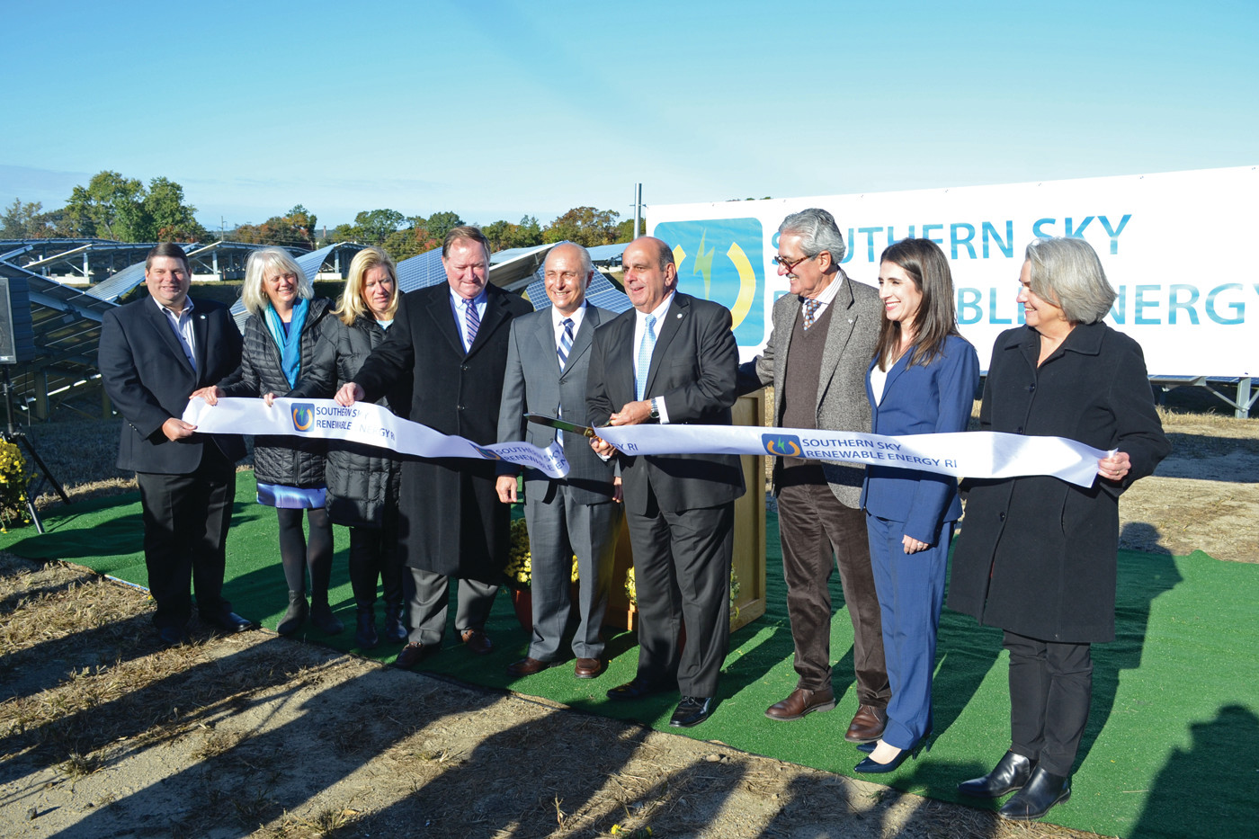 FLIPPING THE SWITCH: A ribbon cutting ceremony for the 15,800-panel array was held on Monday morning.